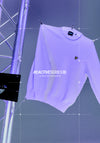 Lyle & Scott UV Reactive Relaxed Crew Neck Jumper in white and washed purple, featuring colour-changing UV-reactive fabric.