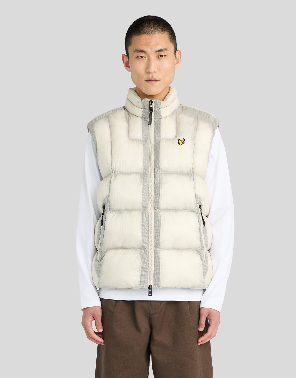 Man wearing Translucent Puffer Gilet in Putty