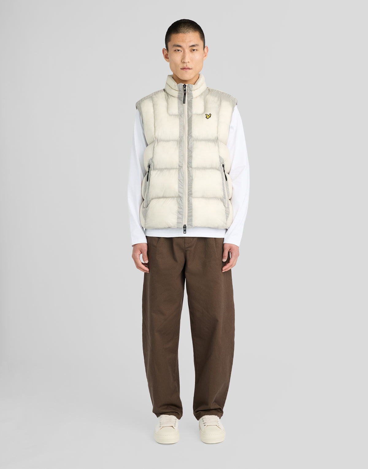 Man wearing Translucent Puffer Gilet in Putty