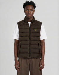 Man wears Heat Reactive Quilted Gilet in Washed Brown / Cove