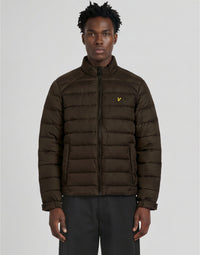Man wears Heat Reactive Quilted Jacket in Washed Brown / Cove