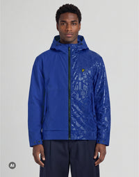 Man wears Water Reactive Shell Jacket in Blue Purple