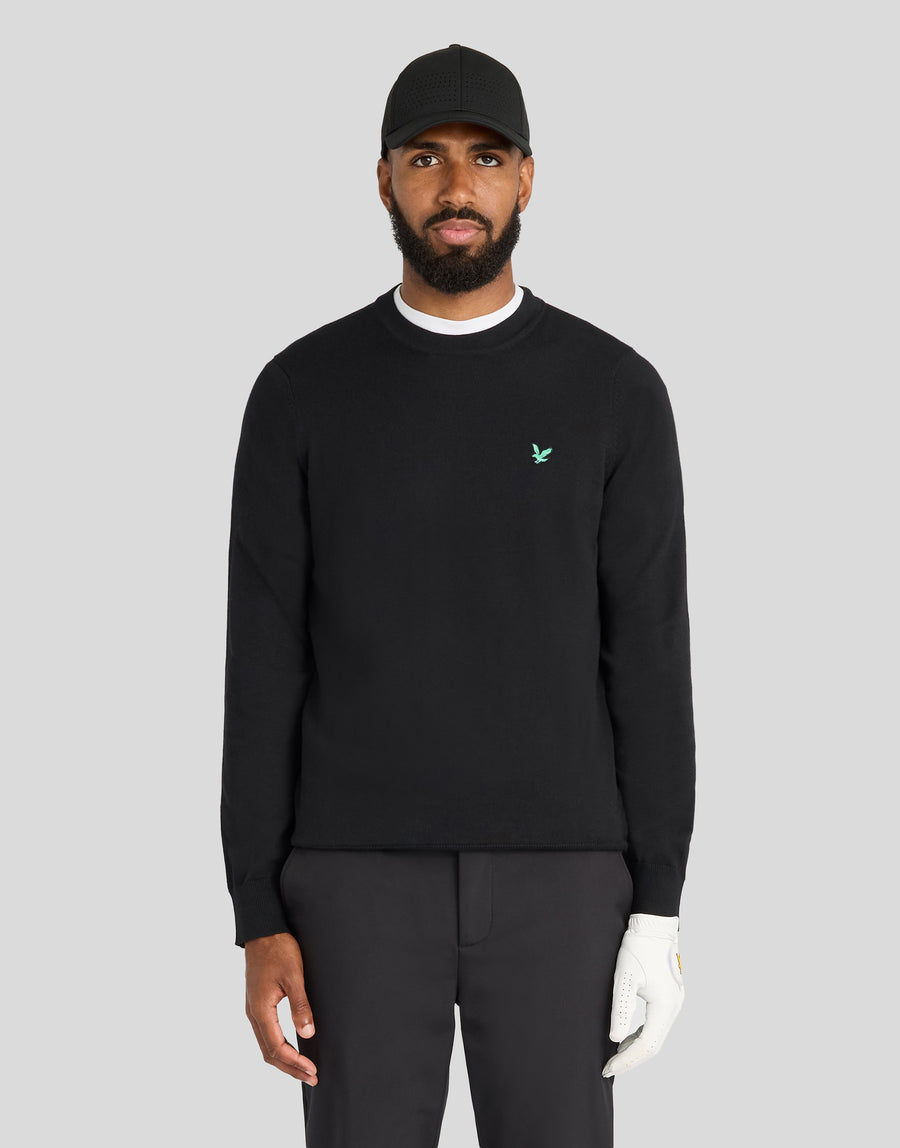 Mann trägt ein „Green Eagle“-Sweatshirt aus Baumwollmischung mit Rundhalsausschnitt in der Farbe „Jet Black“