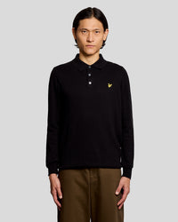 Man wearing Merino Blend Long Sleeve Polo Shirt in Jet Black