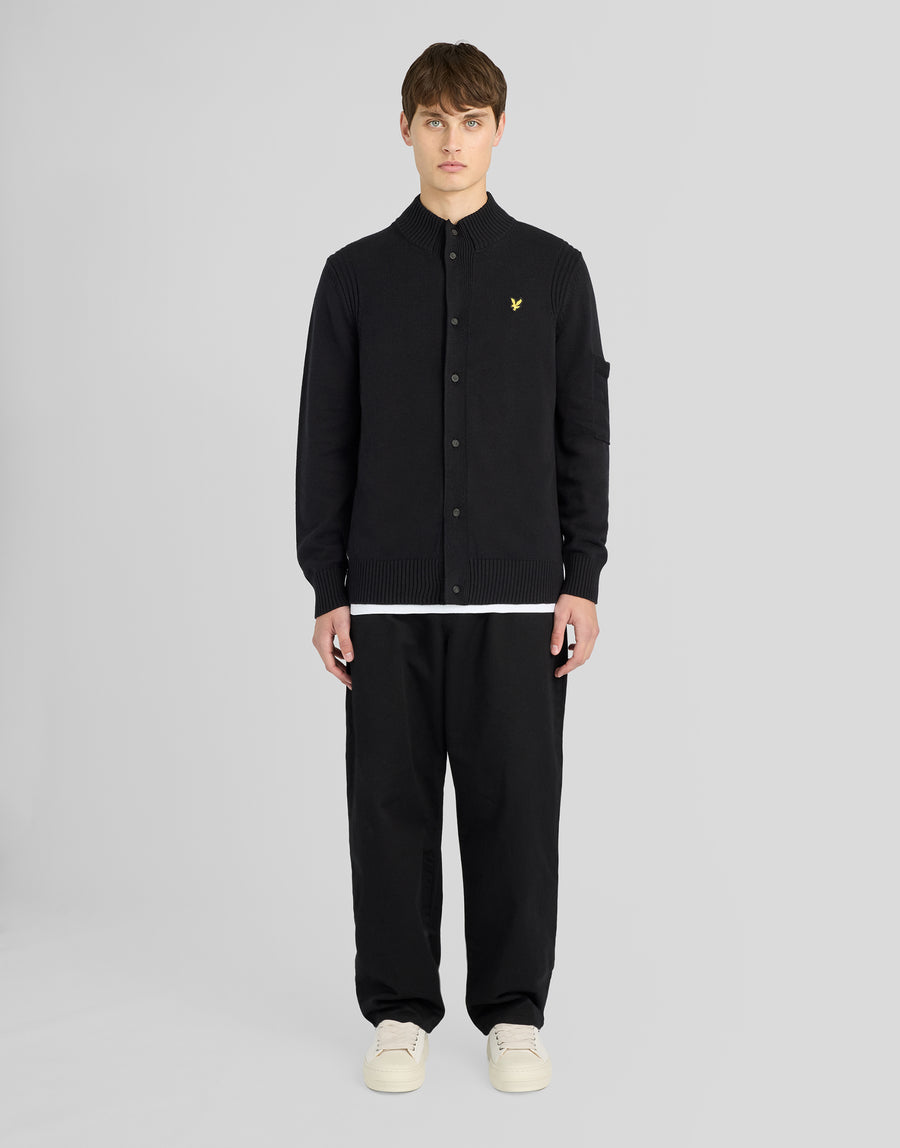 Man wearing Rib Detail Button Cardigan in Jet Black