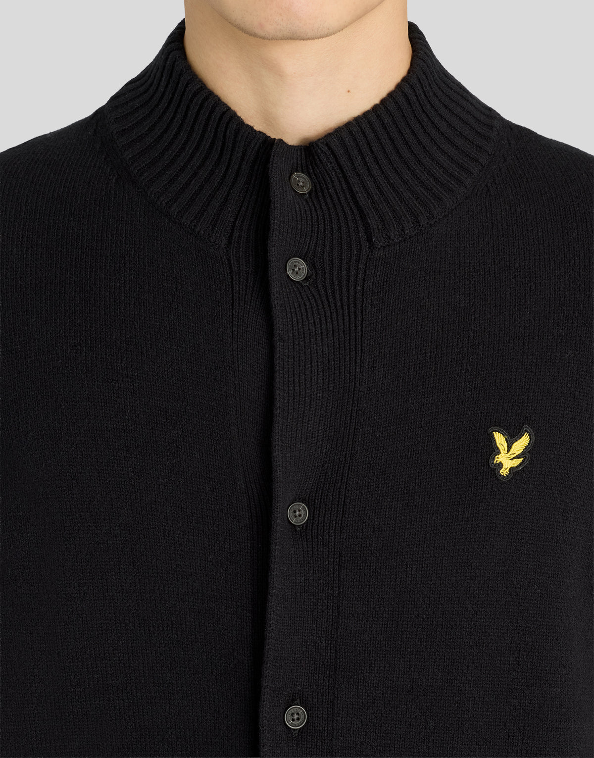 Man wearing Rib Detail Button Cardigan in Jet Black