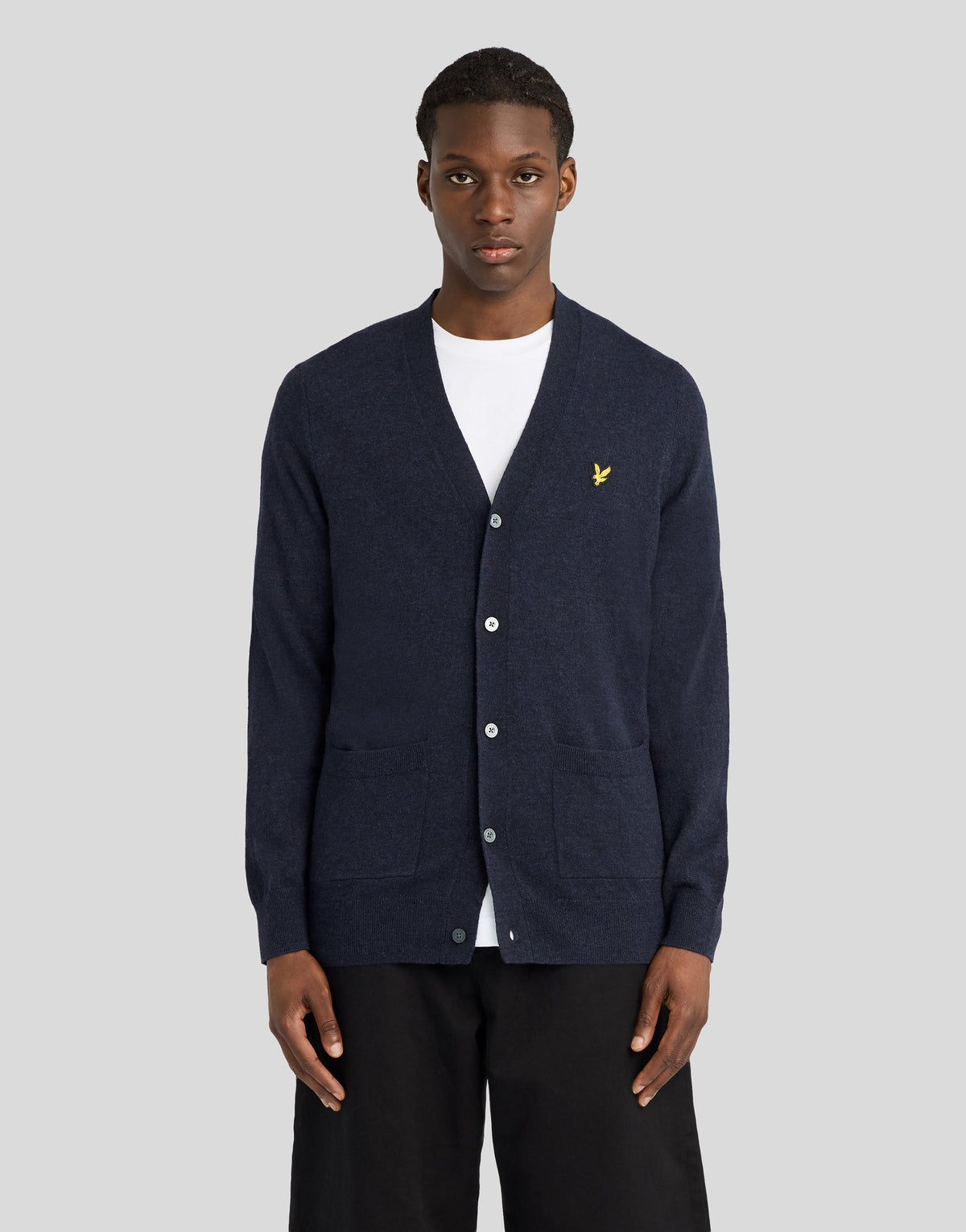 Man wearing Lambswool Blend V-Neck Cardigan in Dark Navy Marl