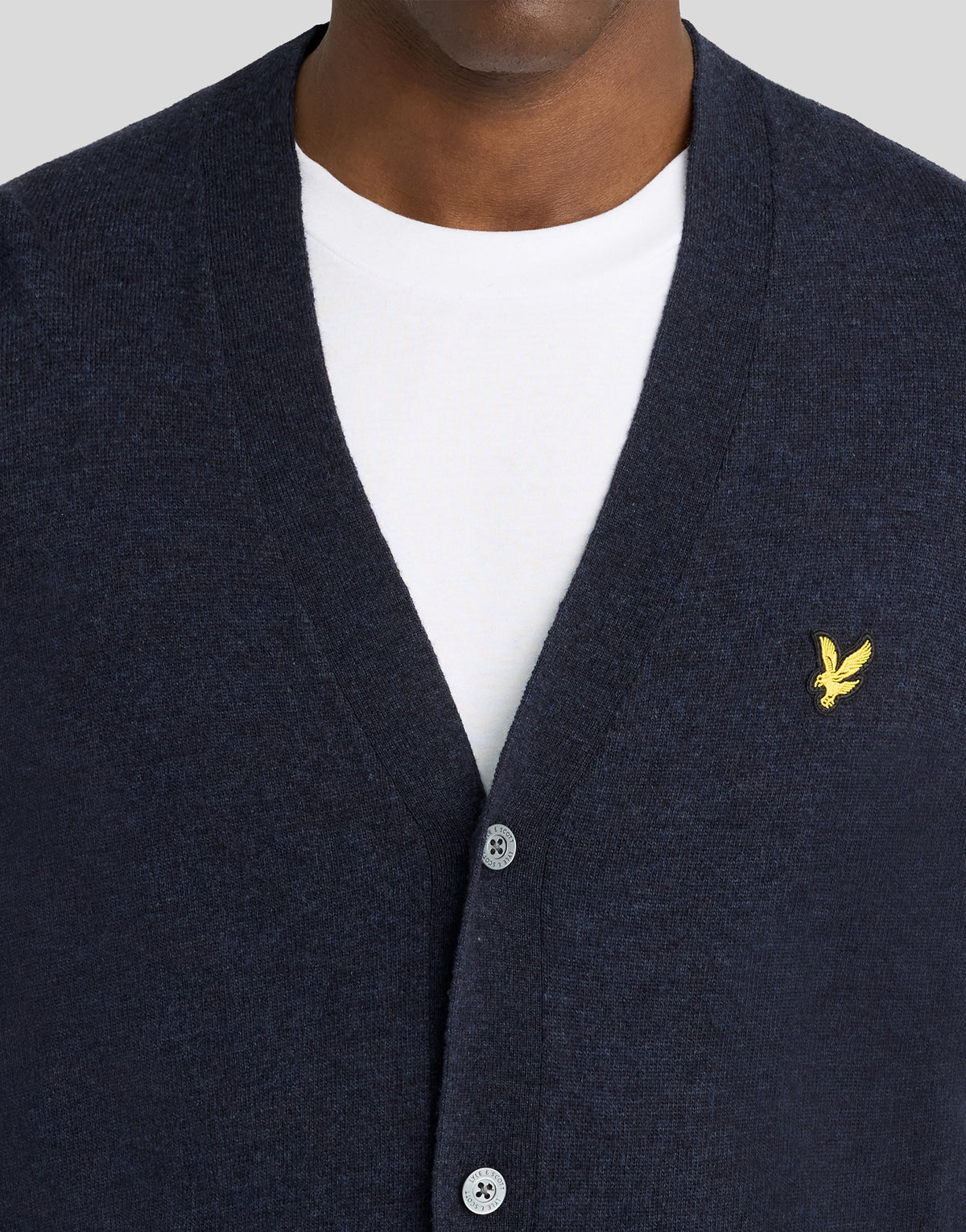 Man wearing Lambswool Blend V-Neck Cardigan in Dark Navy Marl