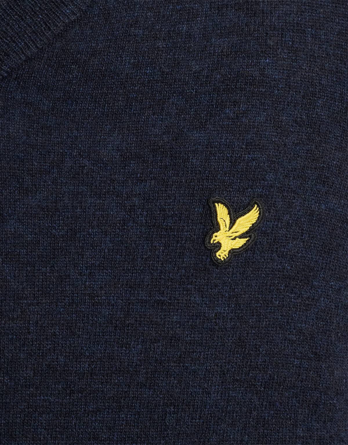 Man wearing Lambswool Blend V-Neck Jumper in Dark Navy Marl