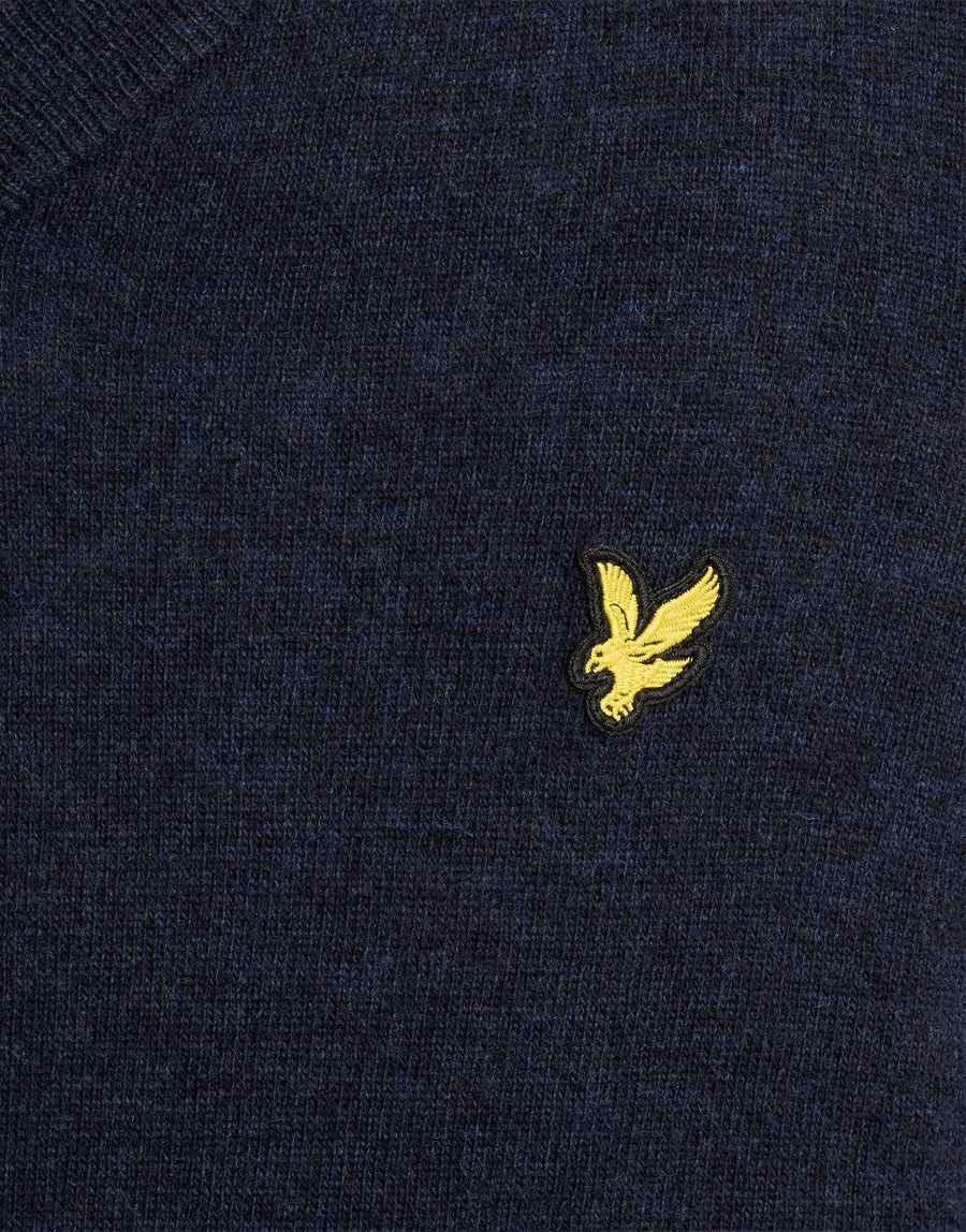 Man wearing Lambswool Blend V-Neck Jumper in Dark Navy Marl