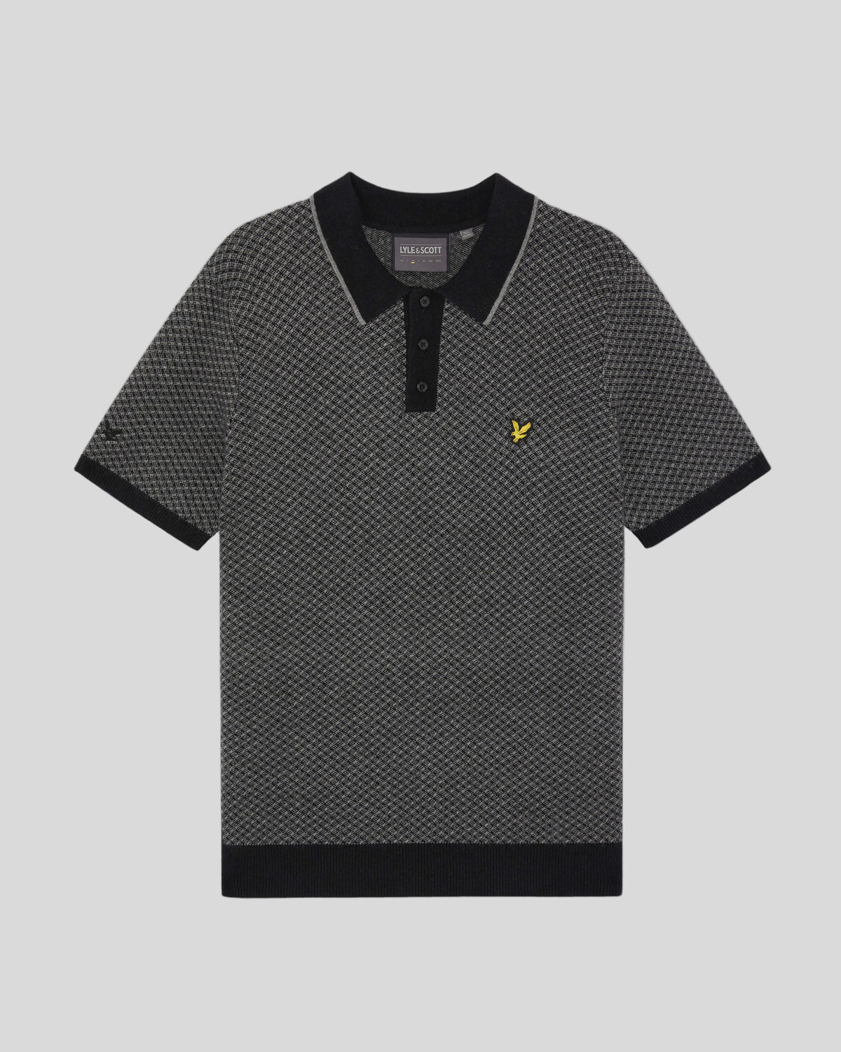 Foto de la camiseta polo de mezcla de cachemira con diseño de rayas cruzadas en negro azabache