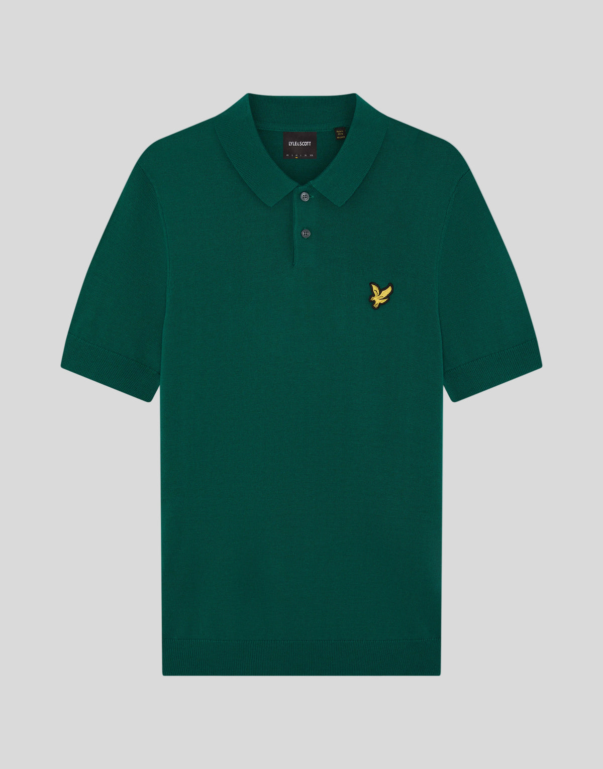 Foto frontale della polo lavorata a maglia Archive abbinata a una giacca verde