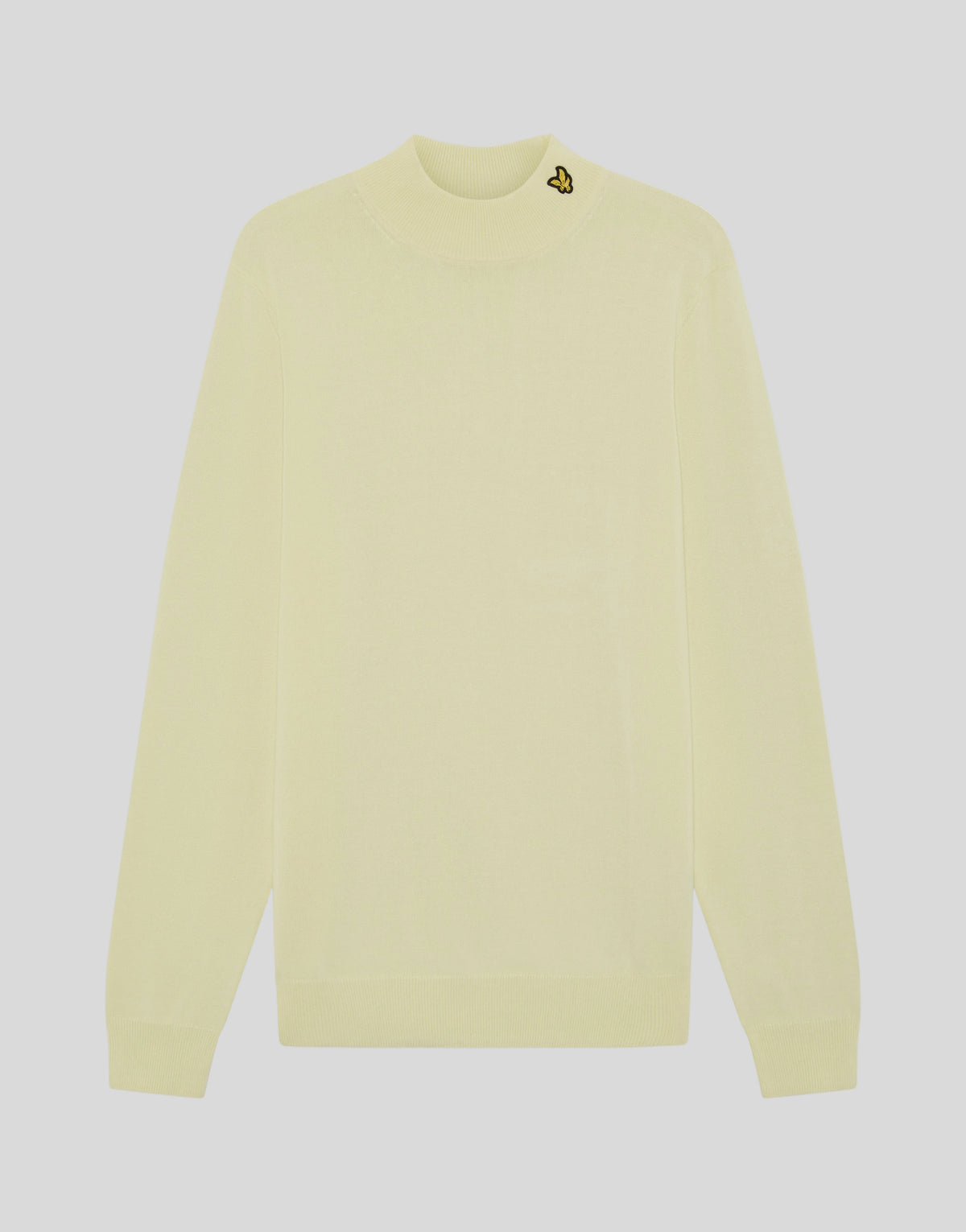 Heltidsbild på den stickade turtleneck-tröjan från Archive i nyansen Muted Ivory