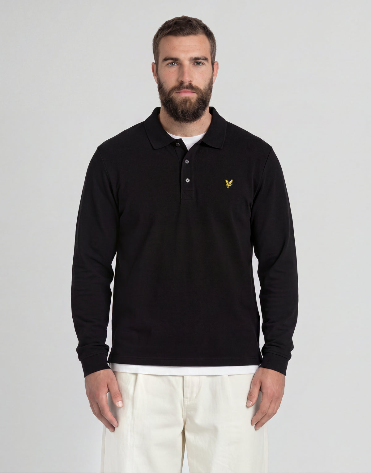Man wears Big & Tall Long Sleeve Polo Shirt Plus in Jet Black