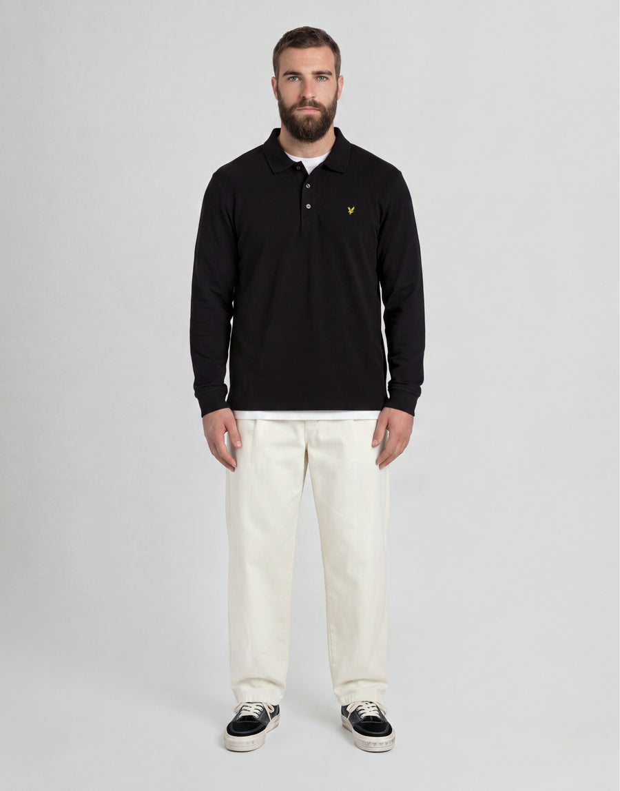 Man wears Big & Tall Long Sleeve Polo Shirt Plus in Jet Black