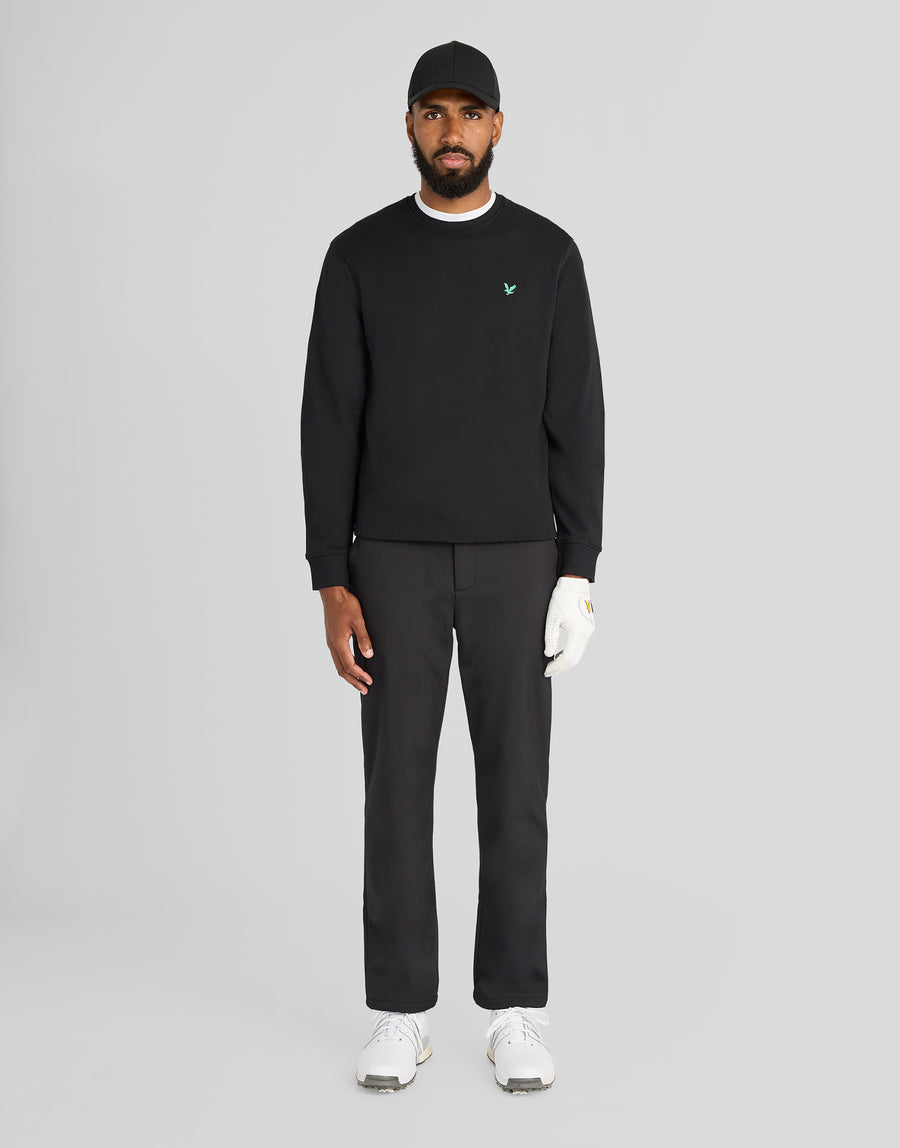 Mann trägt ein „Green Eagle“ Baumwoll-Sweatshirt mit Rundhalsausschnitt in Jet Black
