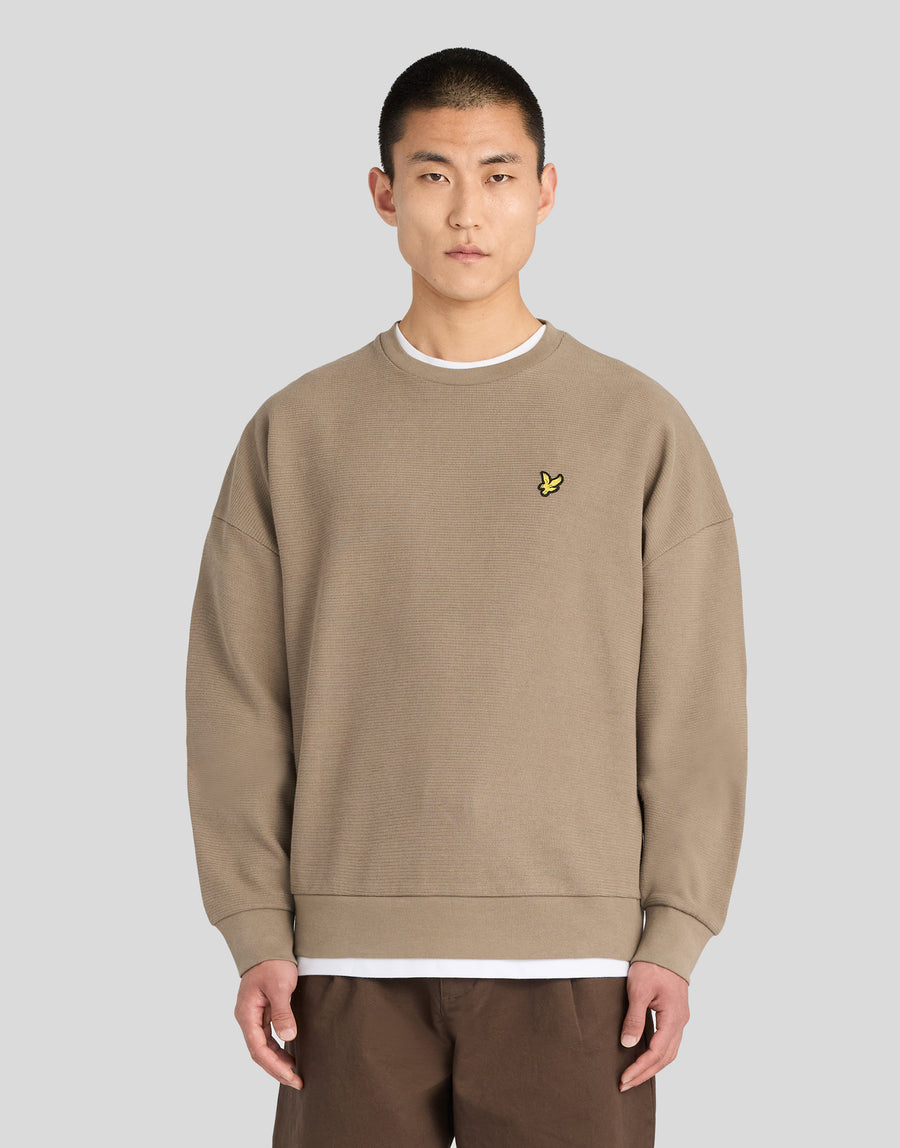 Man wearing Textured Rib Crew Neck Sweatshirt in Khaki Ash