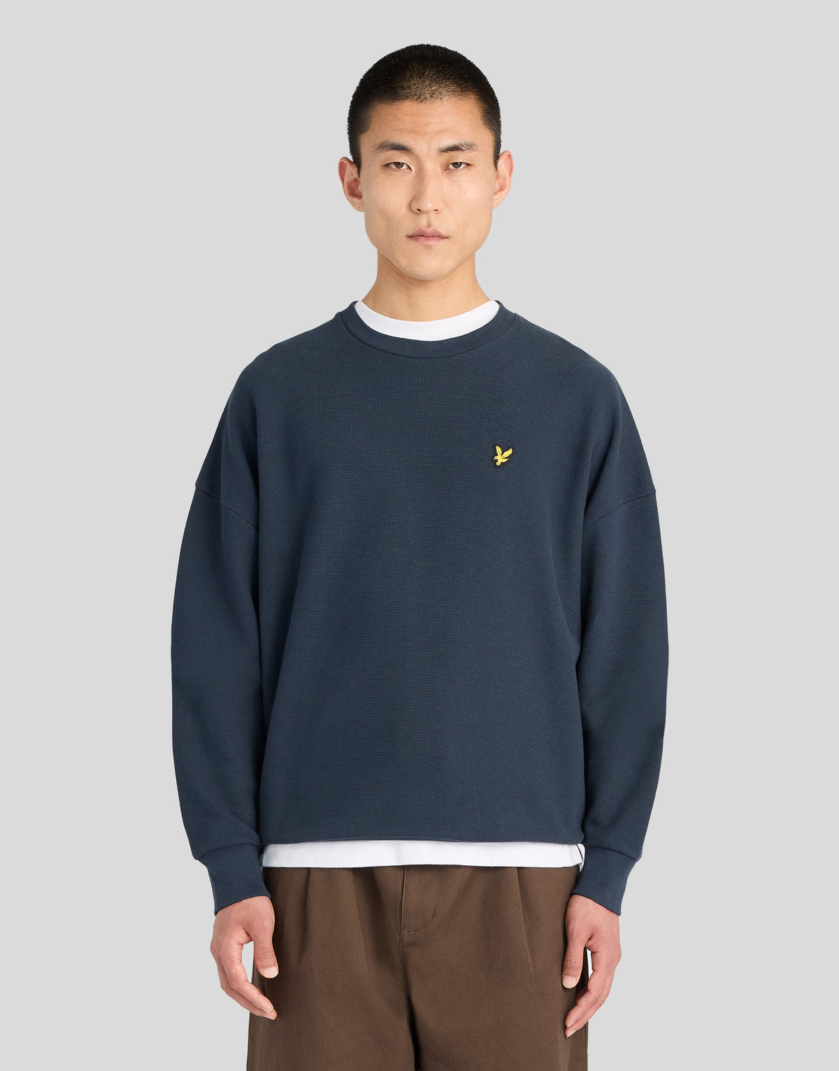 Man wearing Textured Rib Crew Neck Sweatshirt in Dark Navy