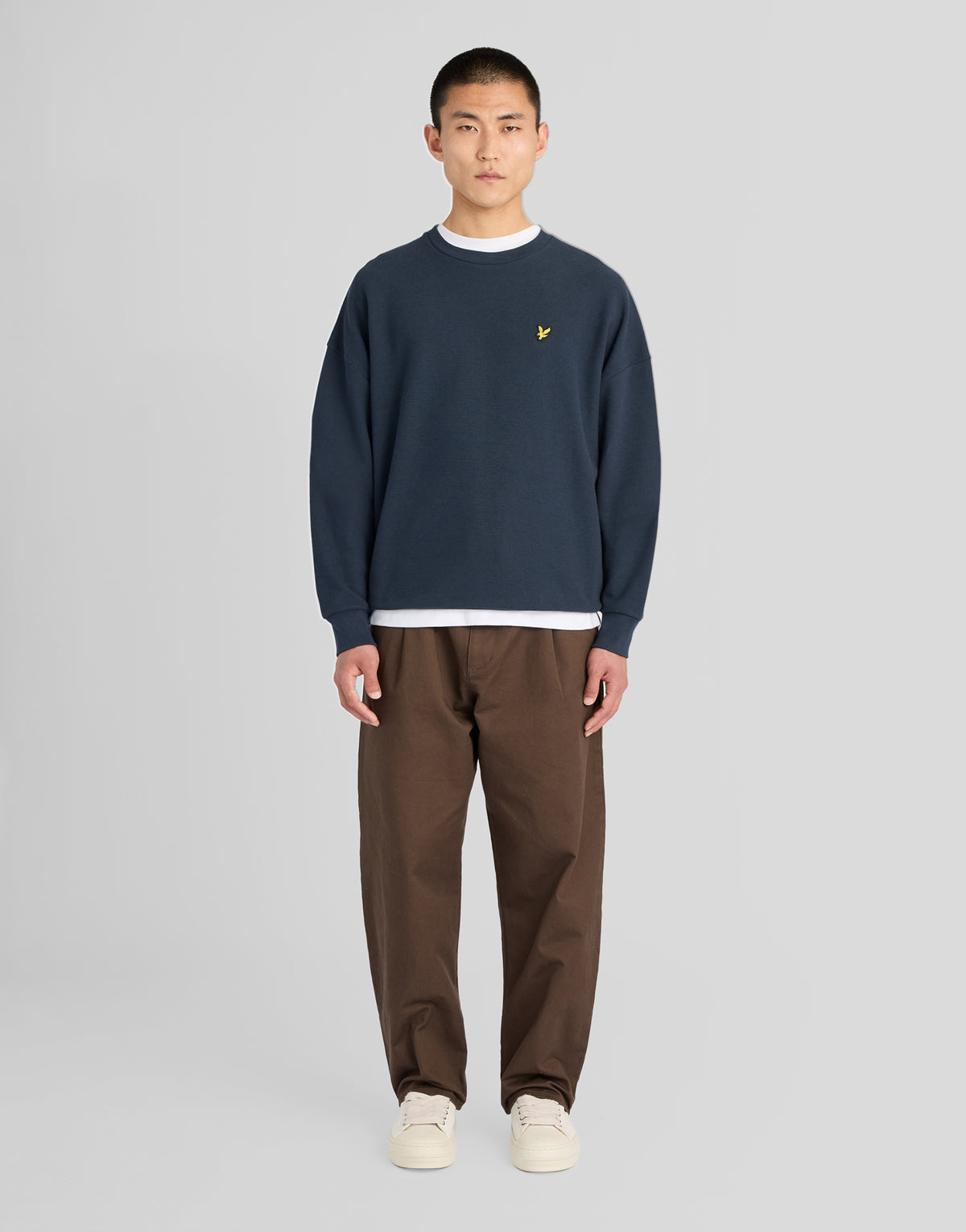 Man wearing Textured Rib Crew Neck Sweatshirt in Dark Navy