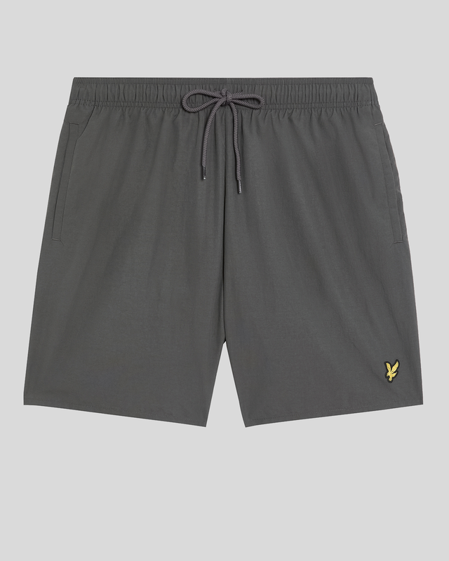 Man wears Plain Swim Shorts in Gunmetal