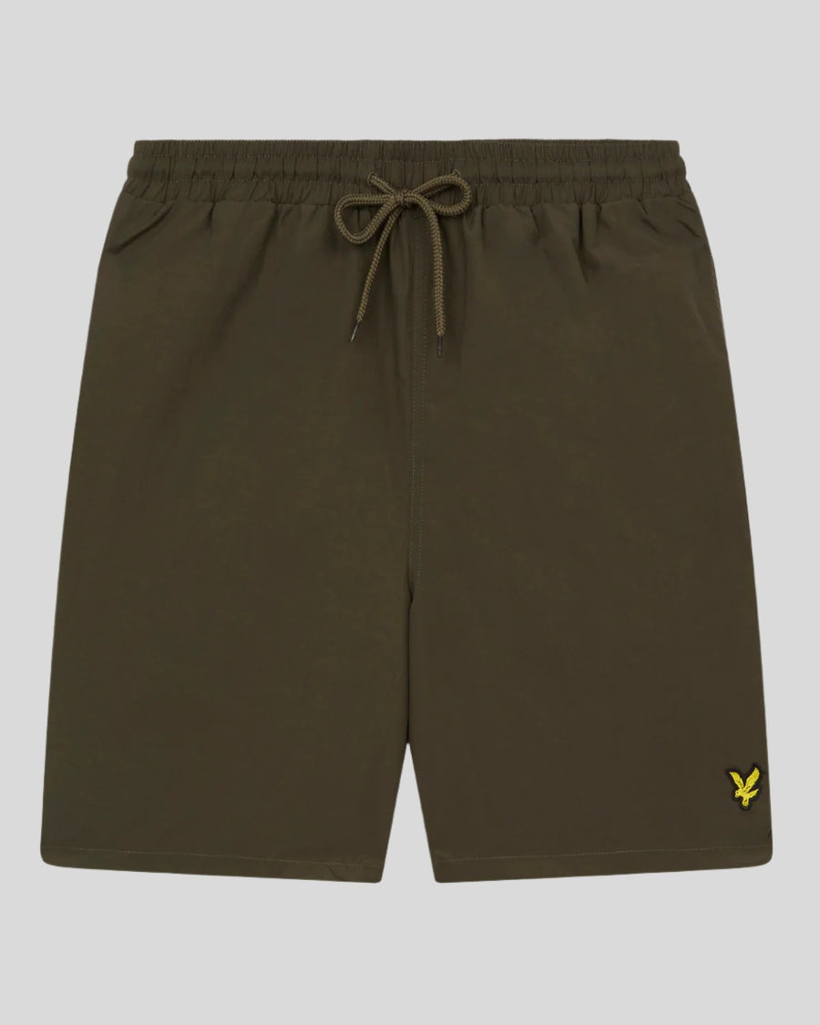 Man wears Plain Swim Shorts in Olive