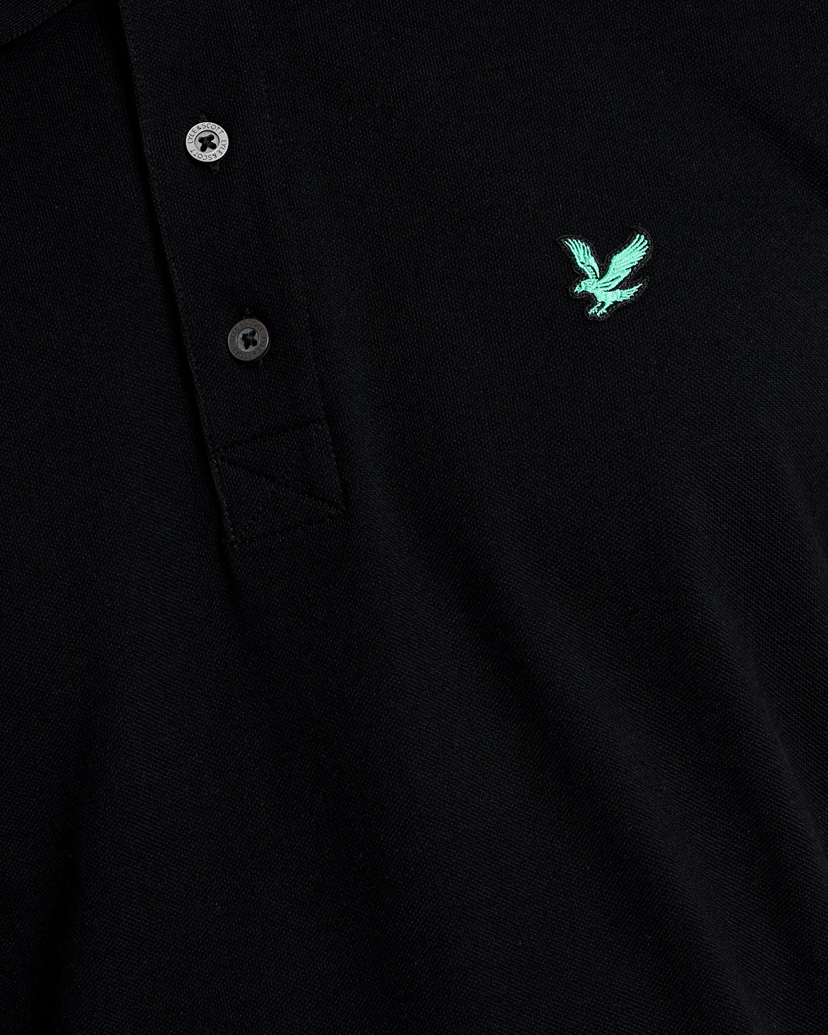 Man wears Green Eagle Cotton Polo Shirt in Jet Black
