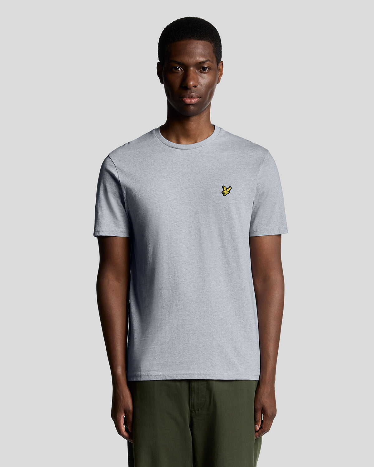 Man wears Cotton Crew Neck T-Shirt in Light Grey Marl