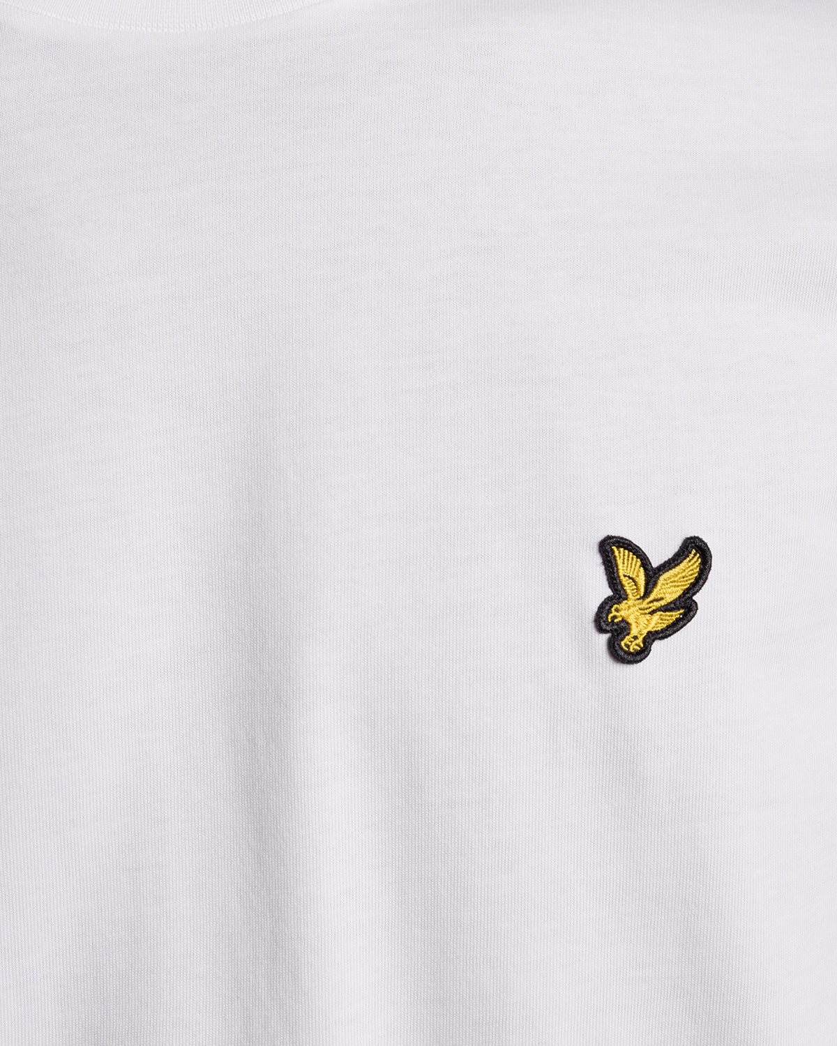 Un homme porte un t-shirt en coton à manches longues blanc