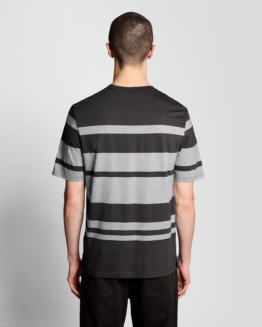Man wears Relaxed Fit Stripe T-Shirt in Charcoal Grey/ Light Grey Marl