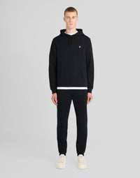 Man wears Everyday Cotton Joggers in Saddle