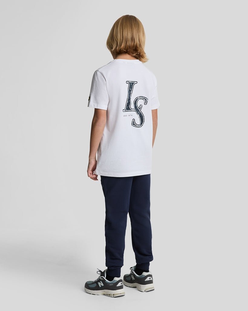 Ragazzo con pantaloni da jogging in cotone blu navy