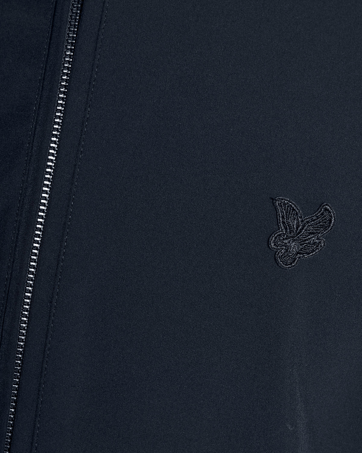 Man wears Lightweight Softshell Jacket in Carbon