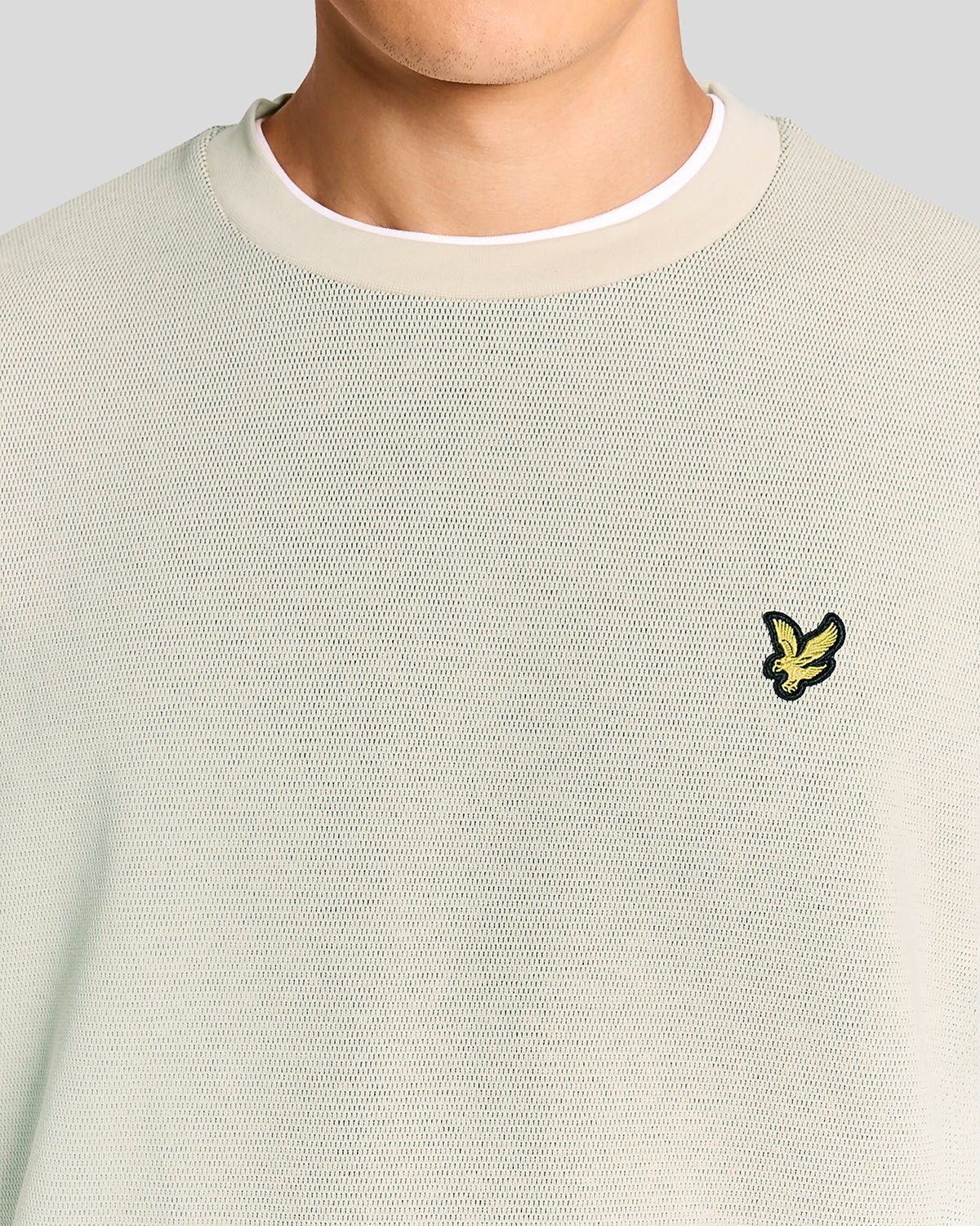 Hombre con sudadera de cuello redondo con jacquard en relieve en color gris claro