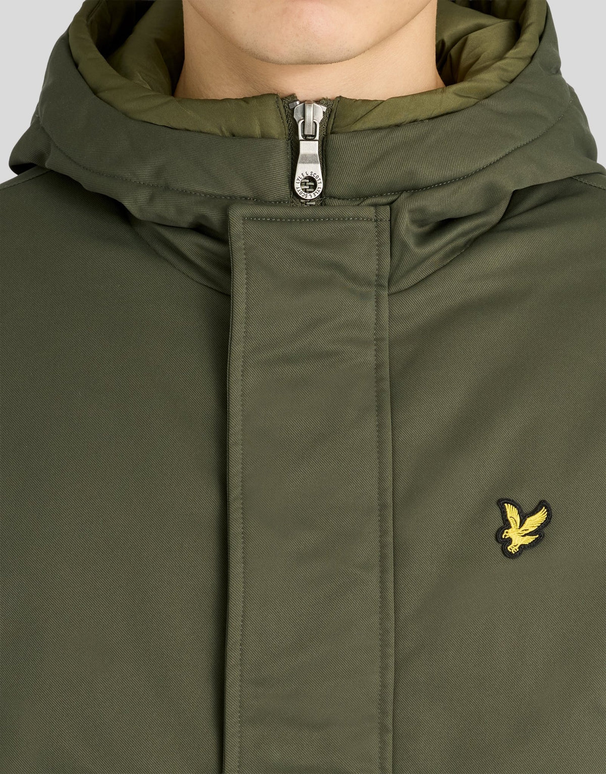 Man wears Padded Fishtail Parka in Deep Depths