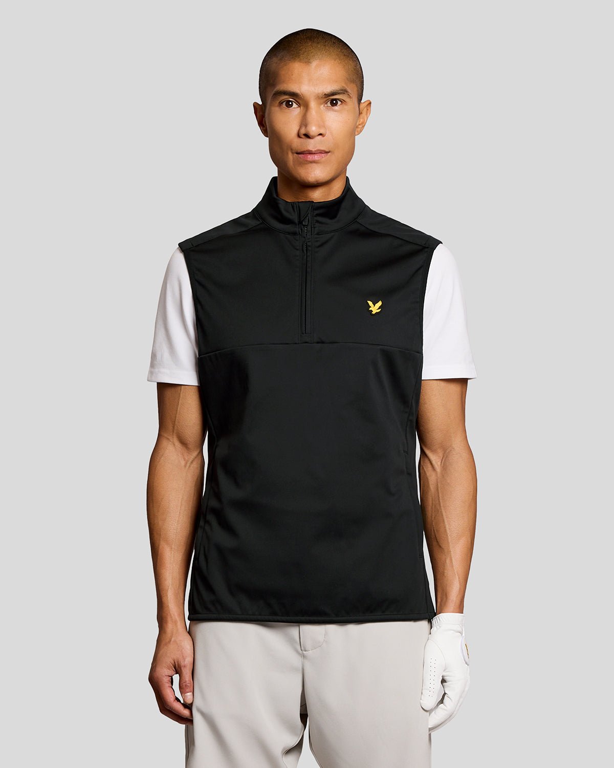 Man wears Windproof 1/2 Zip Gilet in Jet Black