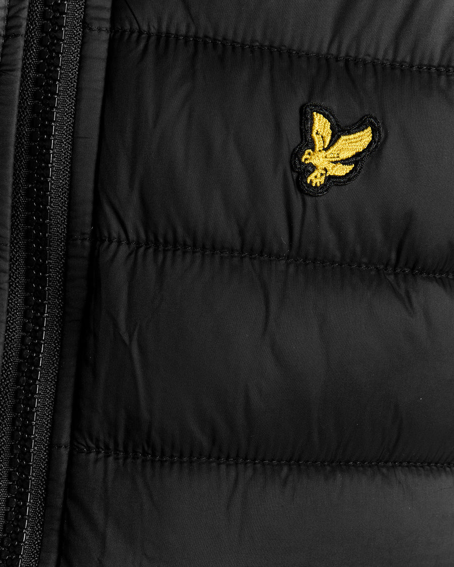 Boy wears Lightweight Padded Jacket in Jet Black