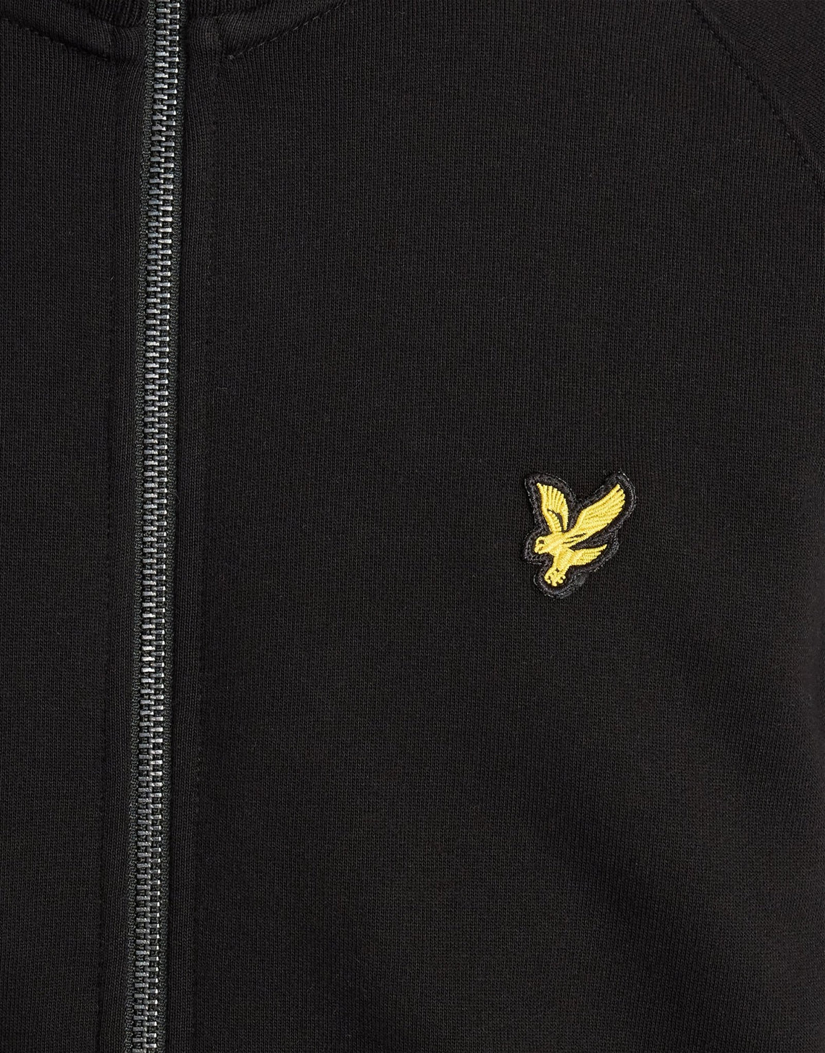Man wears Cotton Tipped Track Jacket in Jet Black
