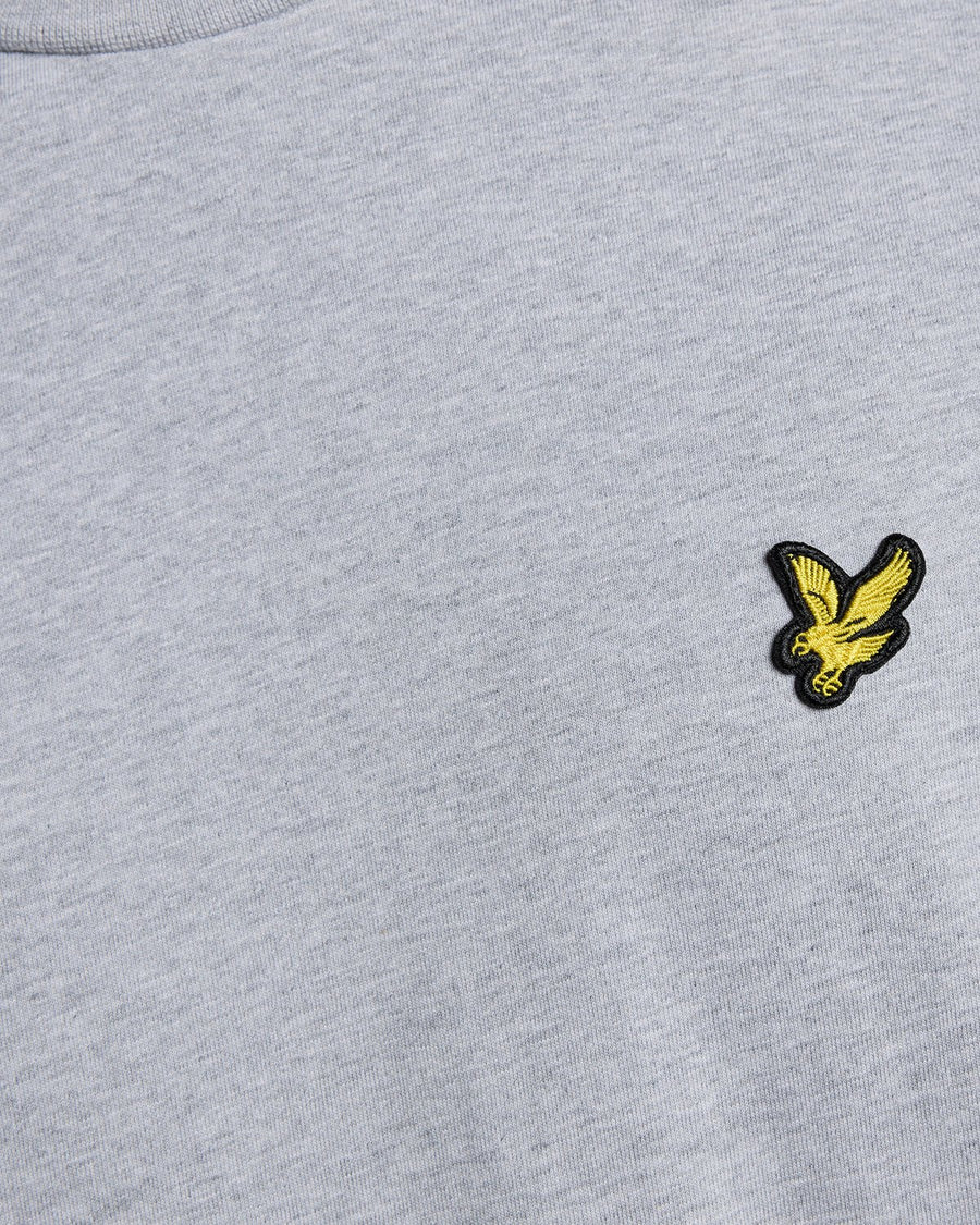 Man wears Cotton Crew Neck T-Shirt in Light Grey Marl