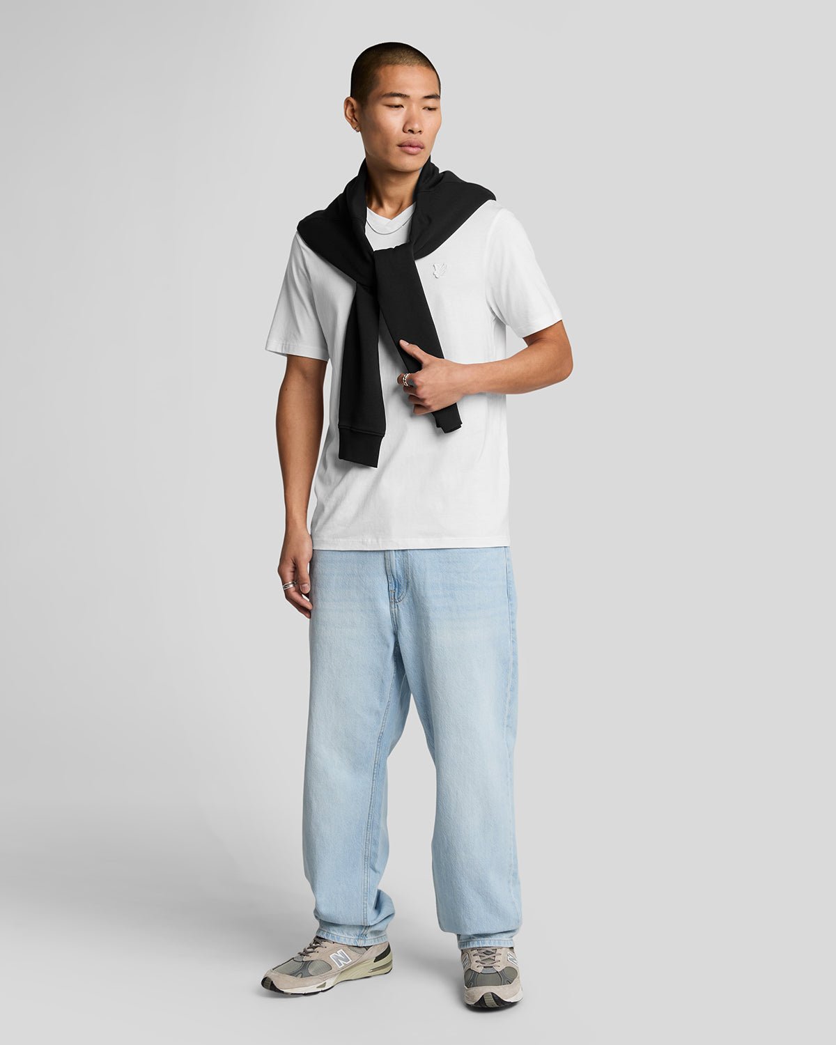 Man wears Superfine Cotton V-Neck T-Shirt in White