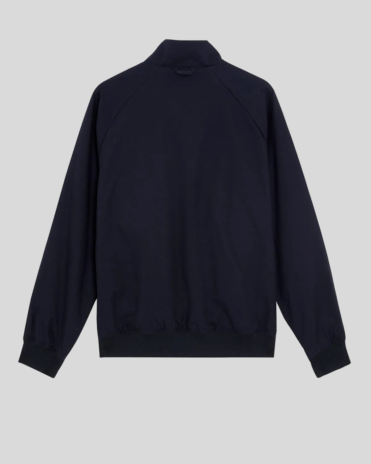Man wears Cotton Harrington Jacket in Dark Navy