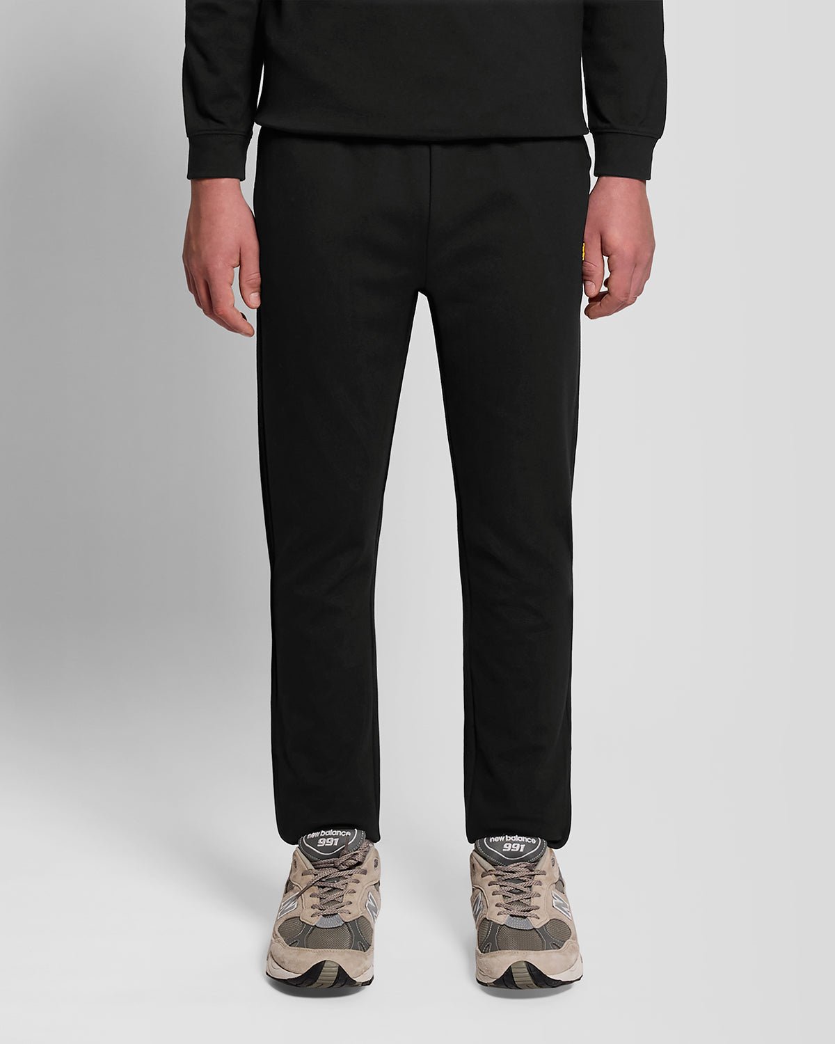Pantalones deportivos ligeros de chándal para hombre en negro azabache