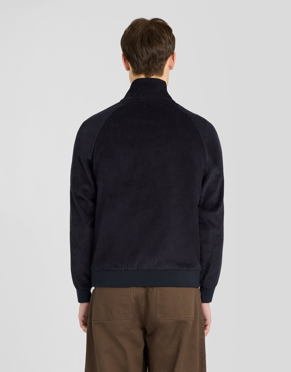 Man wears Corduroy Harrington Jacket in Dark Navy