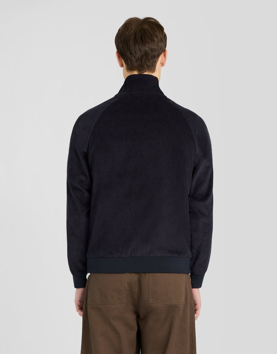 Man wears Corduroy Harrington Jacket in Dark Navy