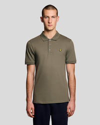 Man wears Everyday Cotton Polo Shirt in Woolwich