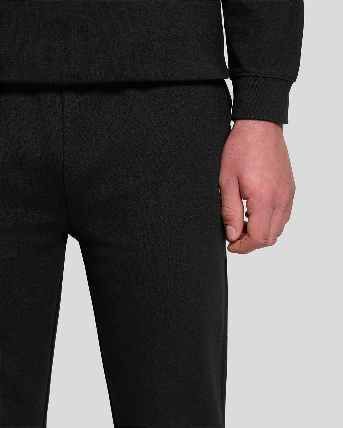 Pantalones deportivos ligeros de chándal para hombre en negro azabache