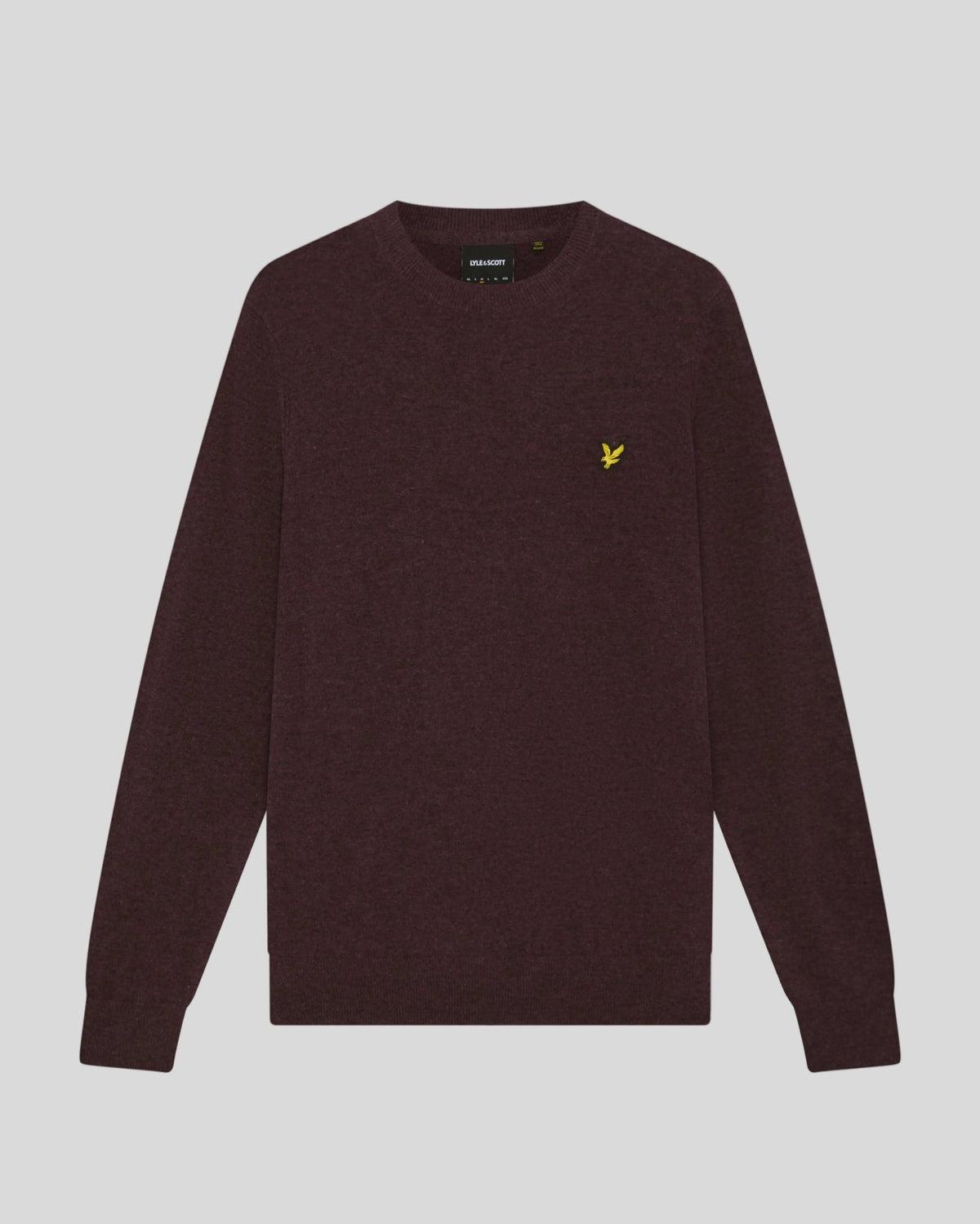 Man wears Lambswool Blend Crew Neck Jumper in Beetroot Marl