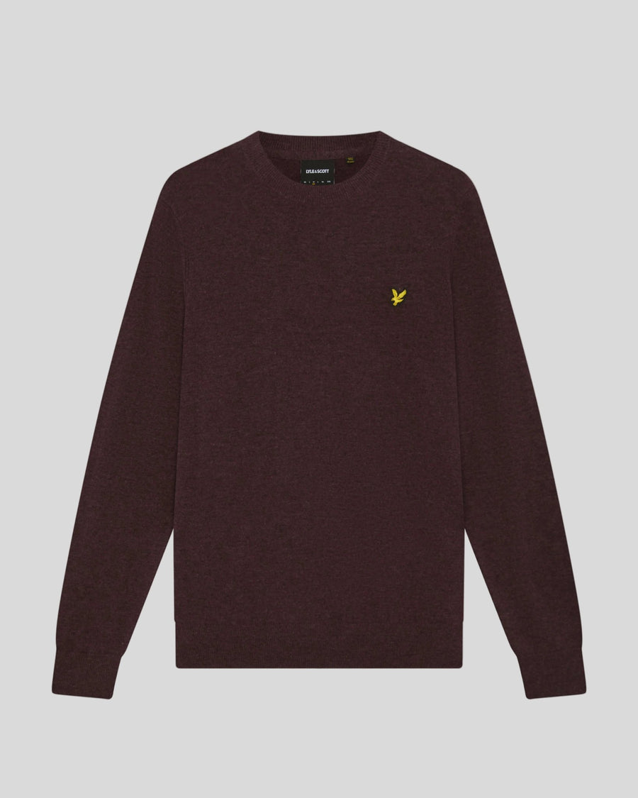 Man wears Lambswool Blend Crew Neck Jumper in Beetroot Marl