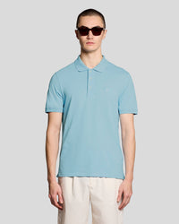 Man wears Superfine Cotton Polo Shirt in Airy Blue