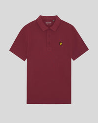 Man wears Technical Polo Shirt in Plum