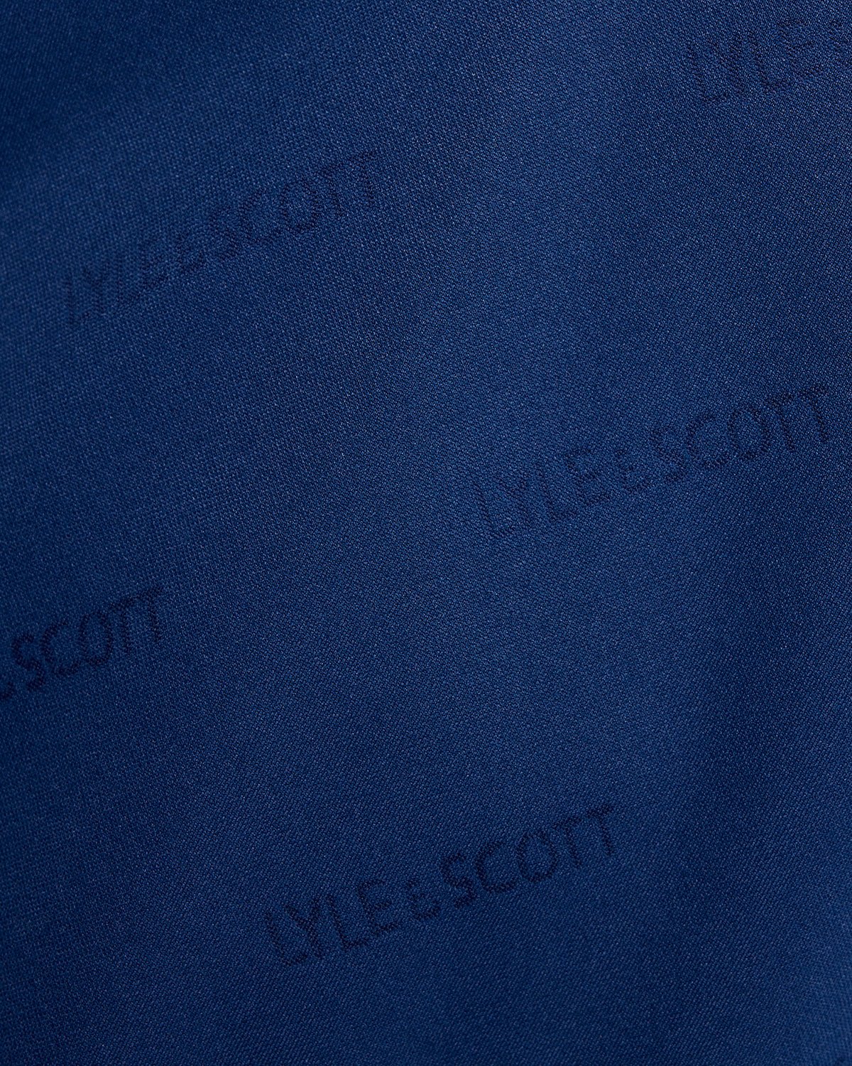 Pantalones cortos de fútbol con el logotipo en relieve, en color azul marino y rosa peonía